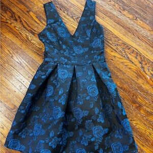 Black and Blue Jacquard cocktail Dress with gold accents and bow in back